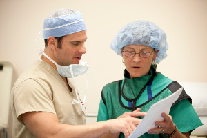 two doctors looking at a file together
