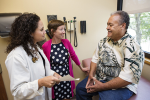 doctors talking to patient